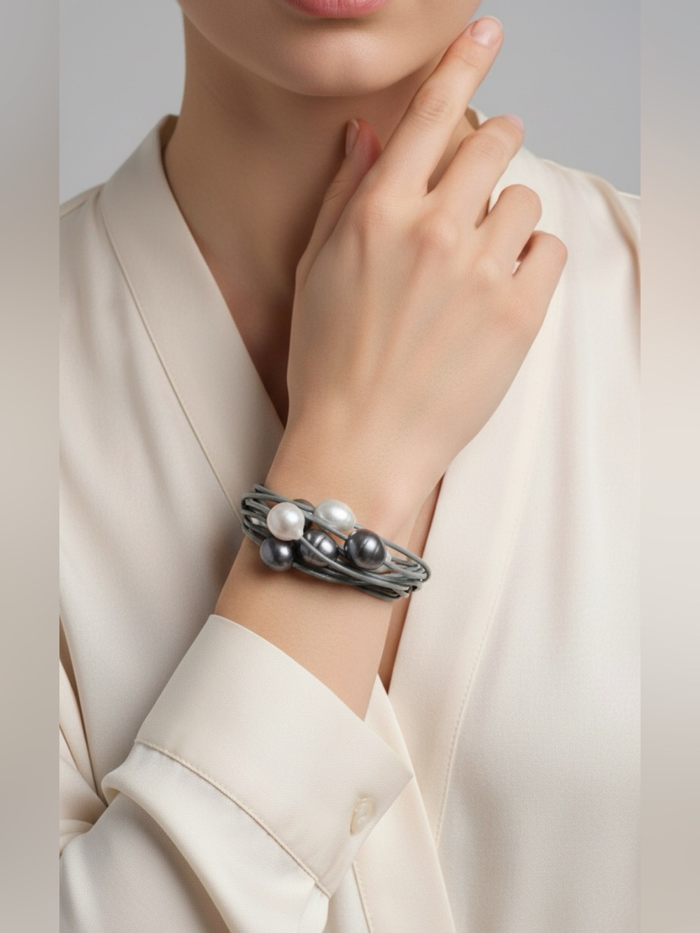 Elegant Multi-Strand Pearl Bracelet in Silver and White